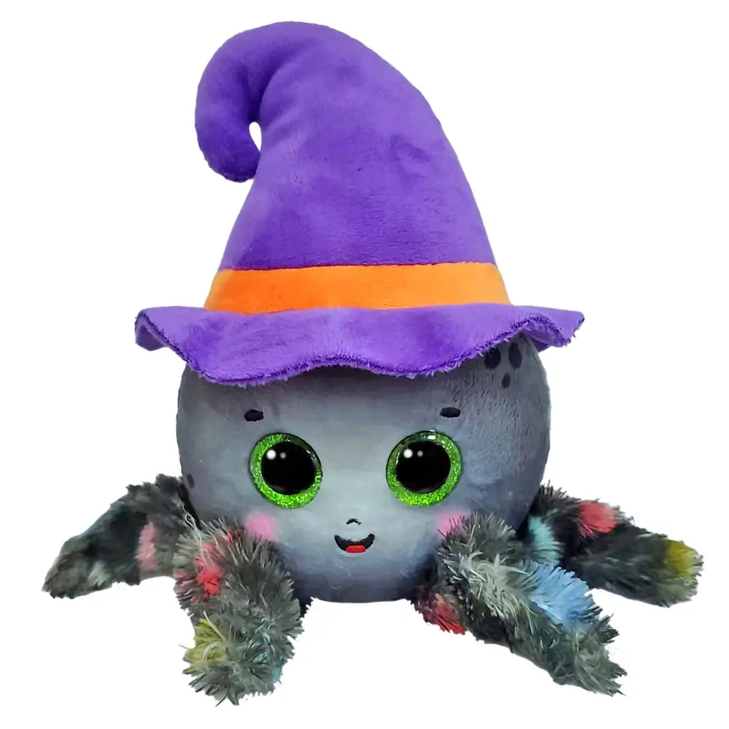 Plush spider toy with round gray body, fuzzy multicolor legs, sparkling green eyes, and a tall purple witch hat with orange band, designed as a festive Ty Beanie Boos Halloween collectible named Weaver.