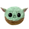 Star Wars Grogu plush by Ty shows soft mint-green and brown fuzzy fabric forming a round figure with large black embroidered eyes, subtle forehead creases, and wide ears presented against a clean white background.