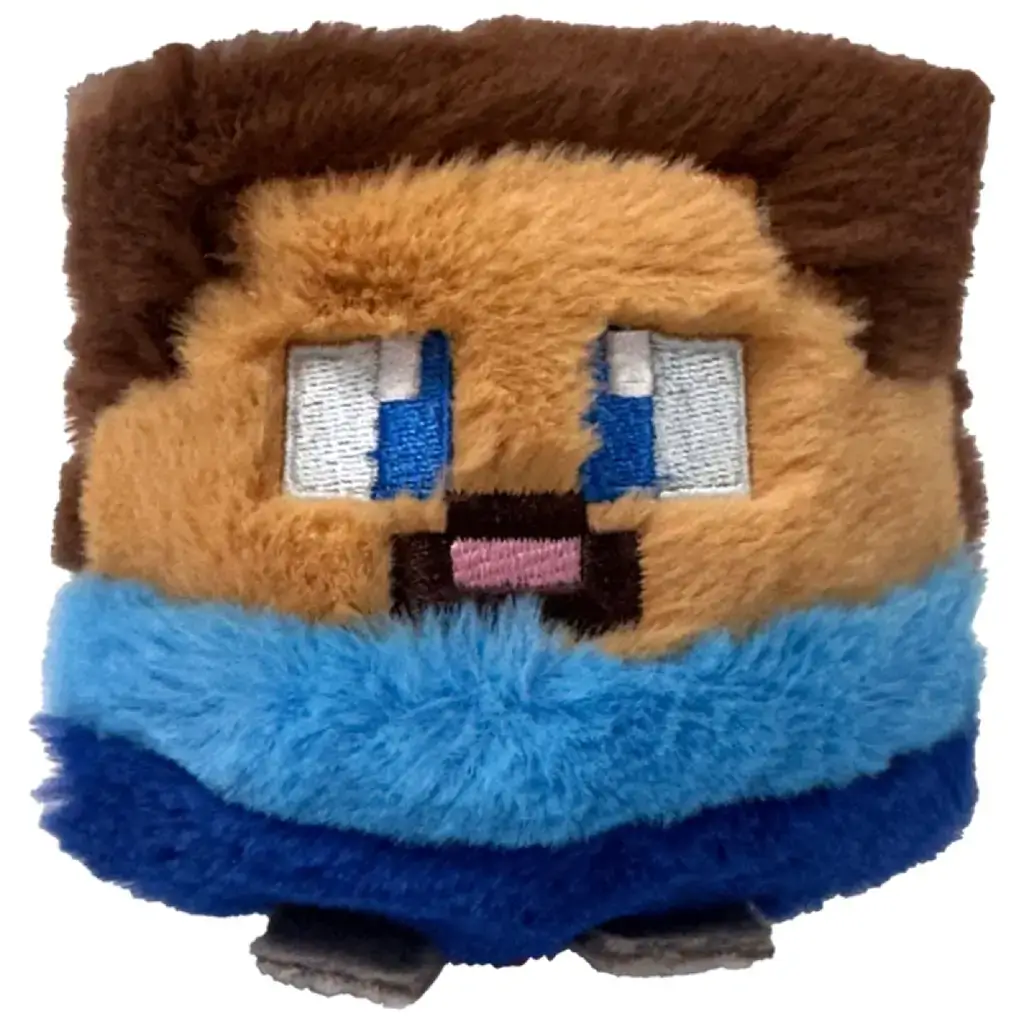 TY Beanie Bouncer Steve plush character features soft tan and brown fuzzy fabric, square block-shaped body, pixel-style embroidered blue and white eyes, small pink mouth, blue shirt, dark blue pants, and compact bouncy toy design on a white background.