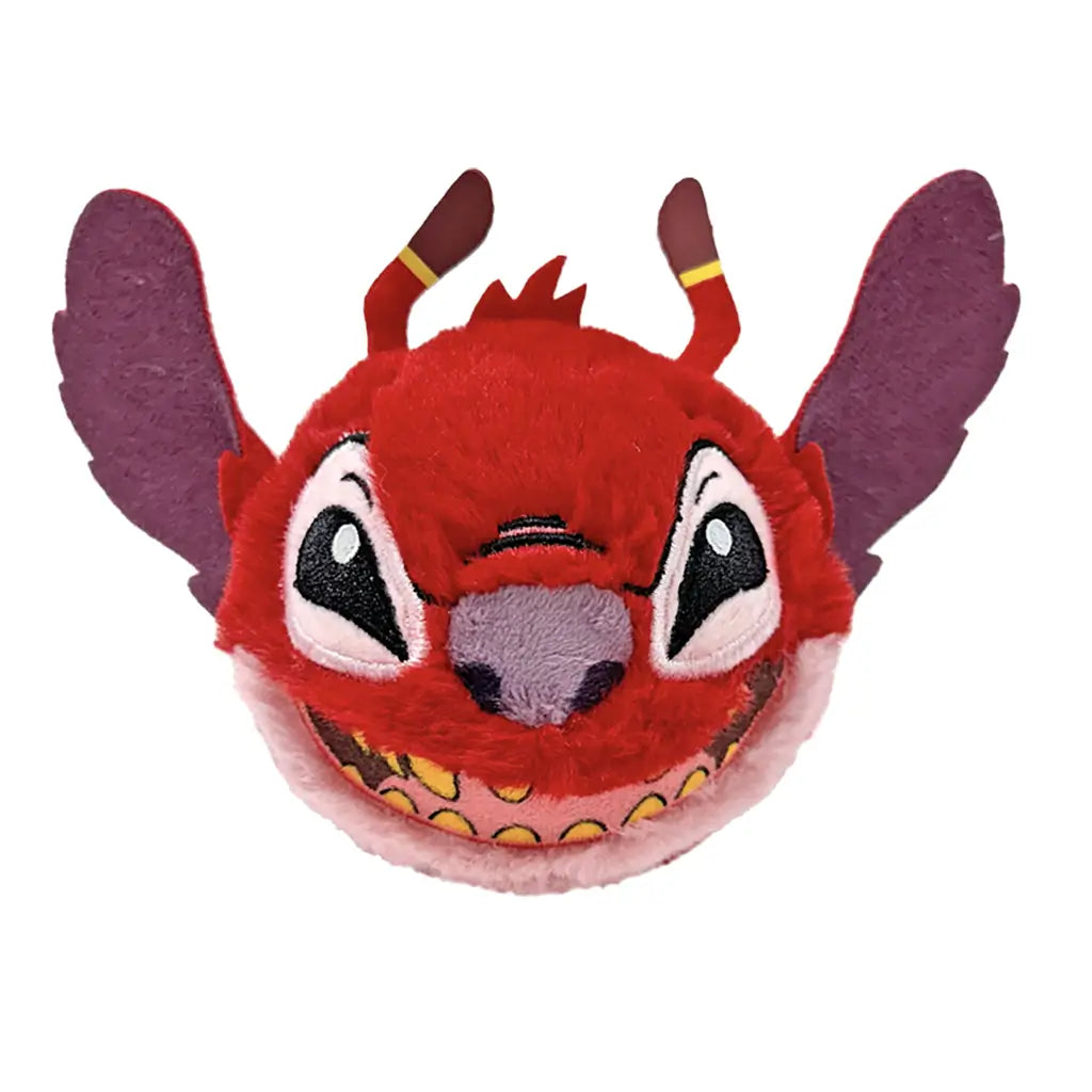 Disney Leroy alien plush toy from Lilo and Stitch in bright red soft fabric with purple inner ears, rounded ball shape, wide grin with yellow teeth and large eyes, bounceable plush on white background