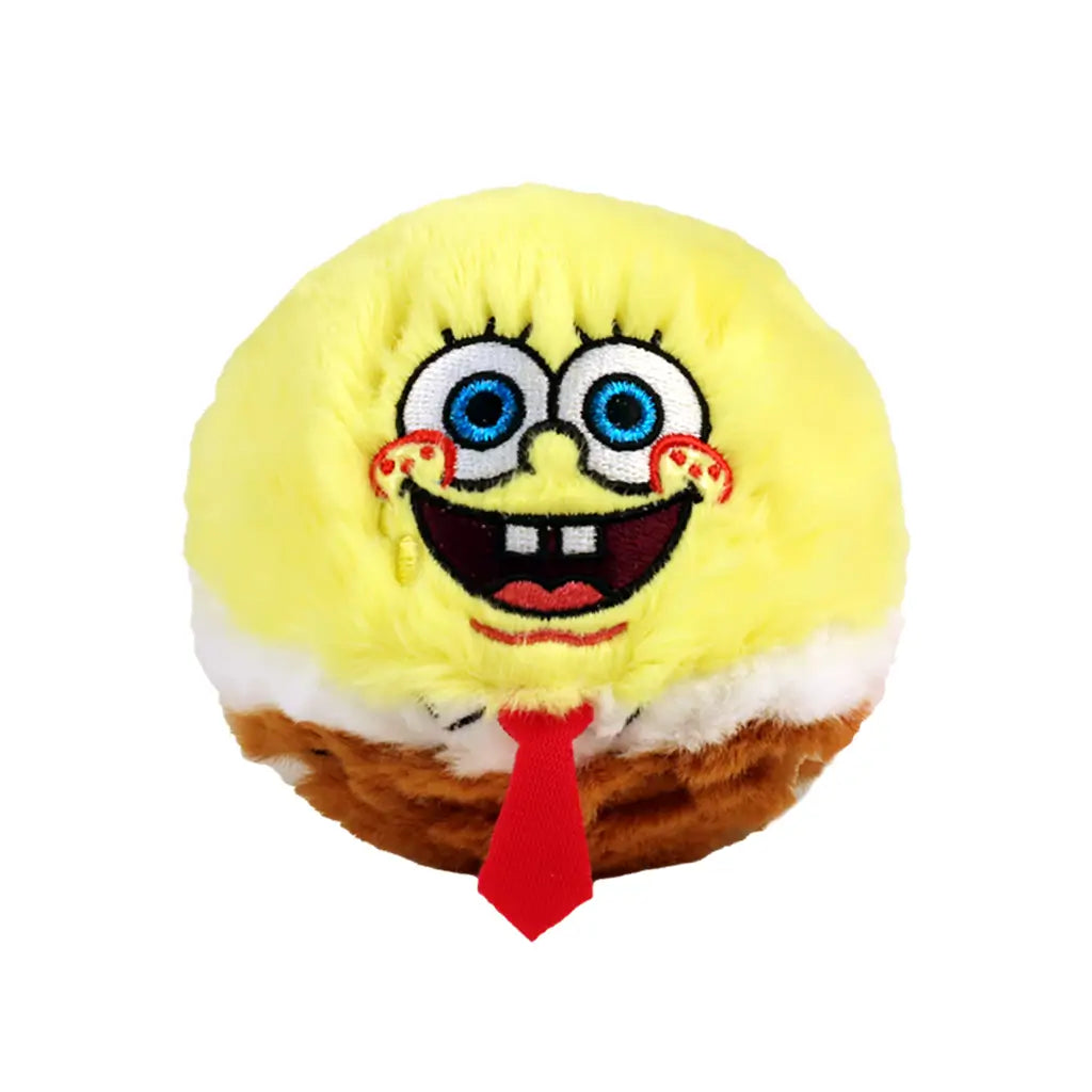 TY Beanie Bouncers SpongeBob plush toy, bright yellow fuzzy sphere with soft texture and embroidered blue eyes, smile, and tie, rounded bouncer shape with brown base on a light background.