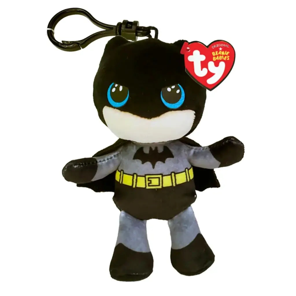 DC Comics Batman plush clip in black and gray soft fabric, with blue eyes, bat emblem, yellow utility belt, cape and plastic hook, shown with a TY Beanie Babies tag on white.