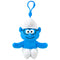 Smurfs Brainy Smurf plush clip in bright blue soft fabric, with black glasses, white hat and pants, smiling face and outstretched arms, hanging from a blue plastic hook on white.