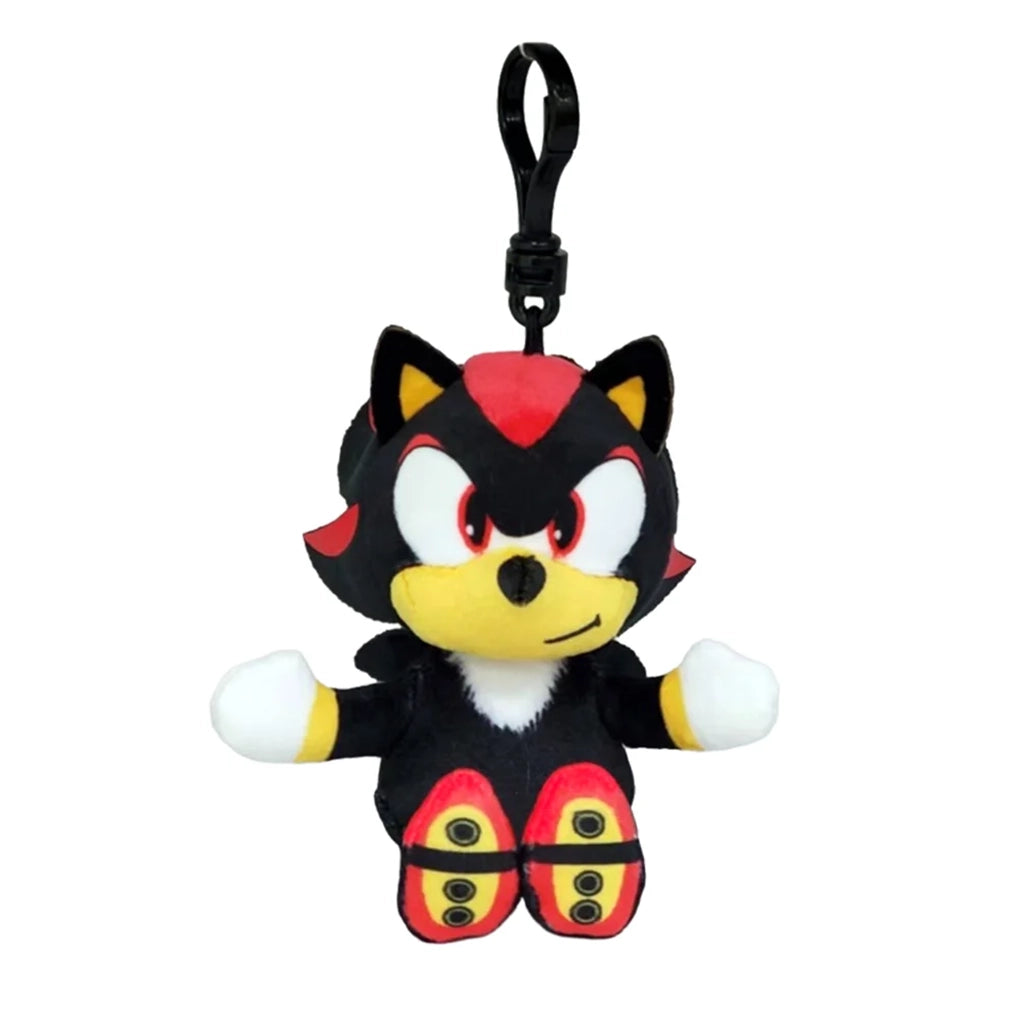 Sonic the Hedgehog Shadow plush clip in black and red soft fabric, with red eyes, tan muzzle, white gloves and red shoes, seated beneath a black plastic hook on a white background.