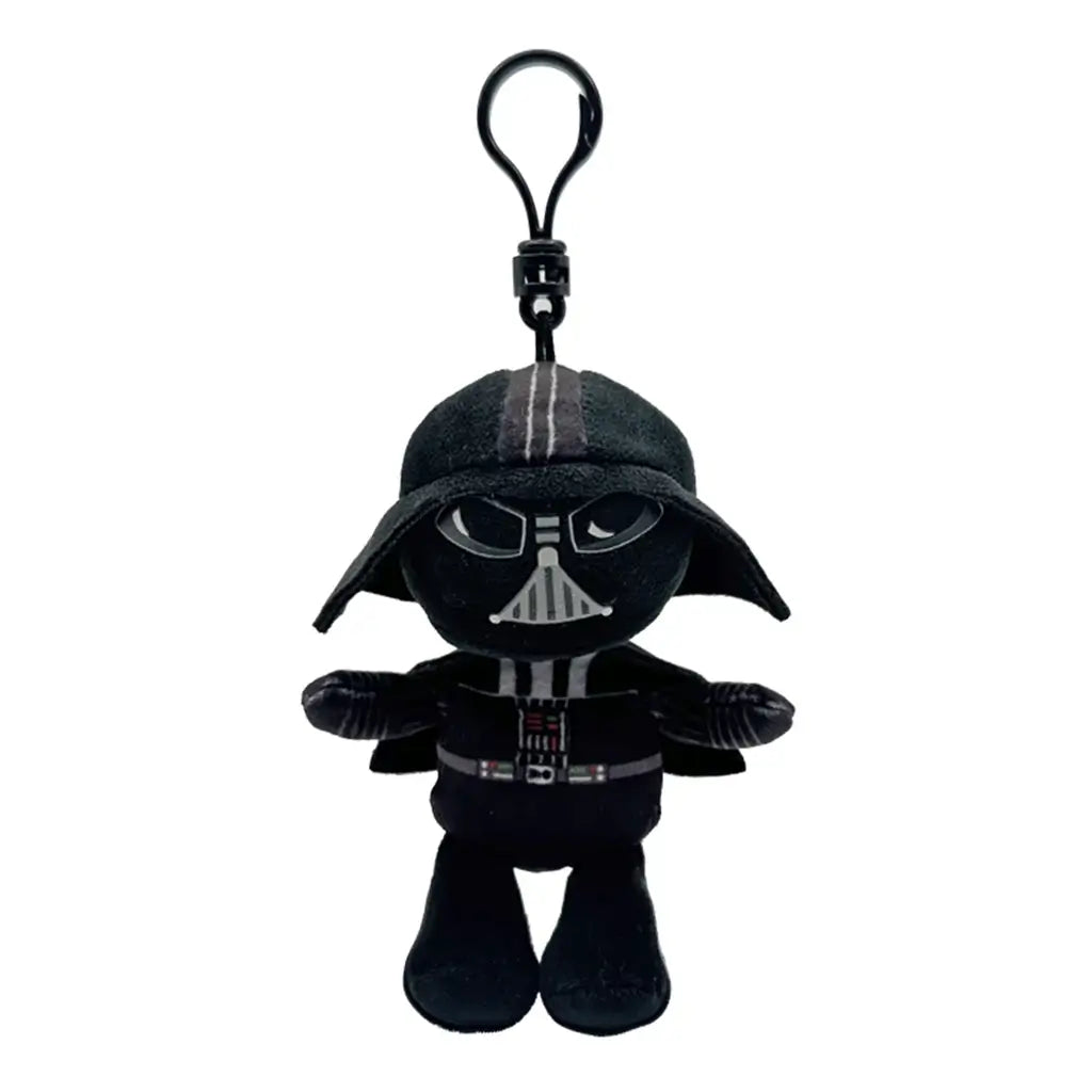 Star Wars Darth Vader plush clip in black soft fabric, with helmet, gray mask details, chest control panel, cape and boots, hanging from a black plastic hook on white.