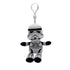 Star Wars Stormtrooper plush clip in white and black soft fabric, with armored helmet, chest and belt details, black gloves and boots, hanging from a white plastic hook on white.