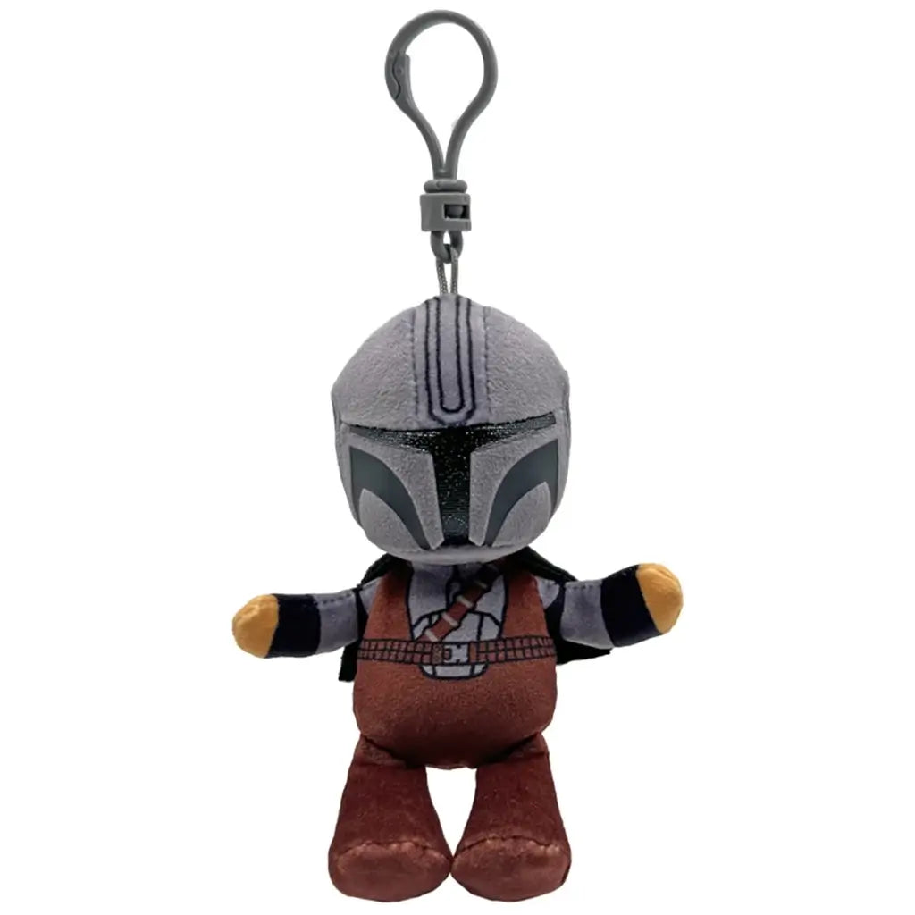 Star Wars The Mandalorian plush clip in gray and brown soft fabric, with silver helmet, dark visor, cape and printed armor details, hanging from a gray plastic hook on white.