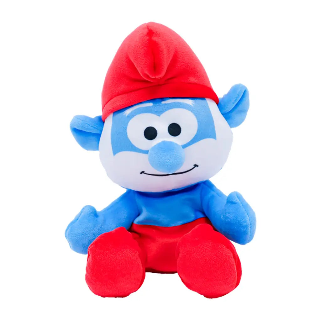 Papa Smurf plush toy in blue soft fabric with a bright red hat and pants, white beard, round blue nose, large ears, stitched smile, and red feet on a plain white background.