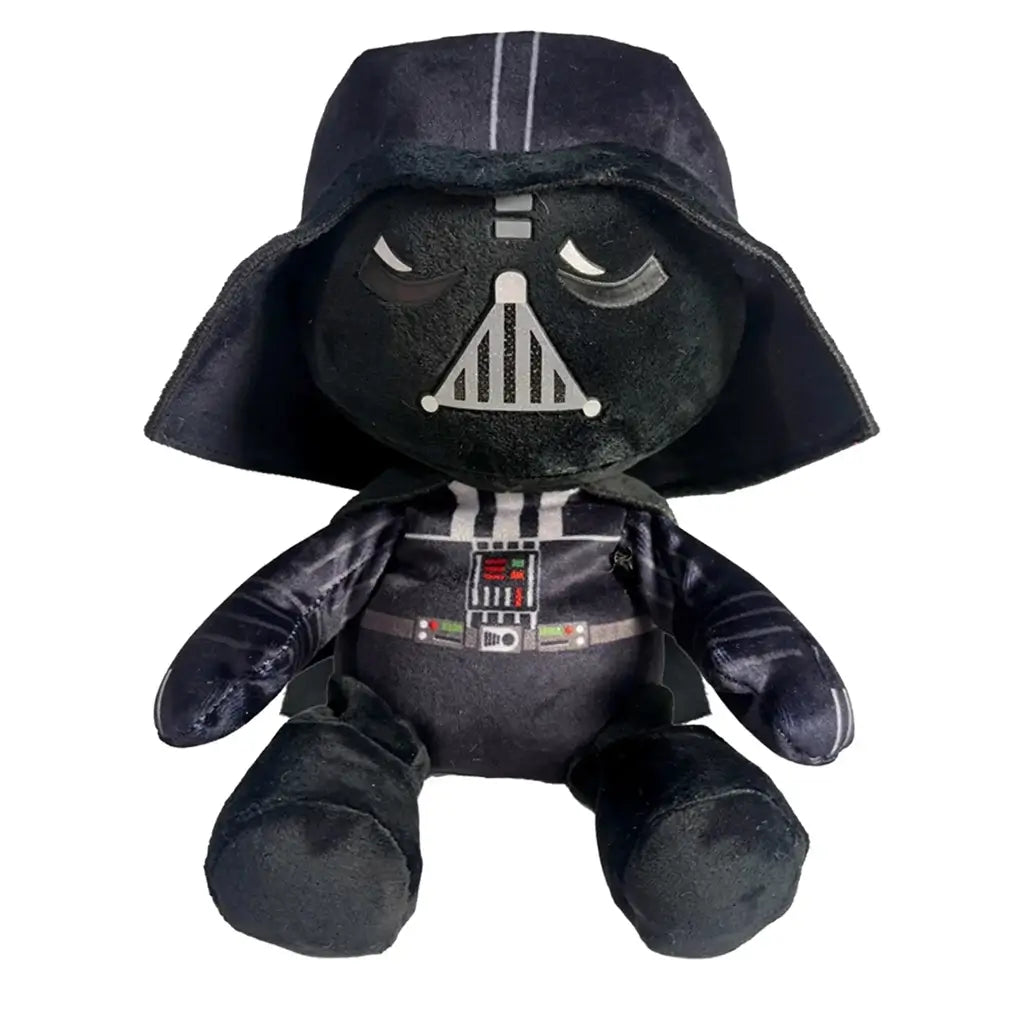 Star Wars Darth Vader plush toy in black soft fabric, with a rounded helmet, gray mask details, chest control panel and cape, seated against a clean white background.