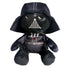 Star Wars Darth Vader plush toy in black soft fabric, with a rounded helmet, gray mask details, chest control panel and cape, seated against a clean white background.