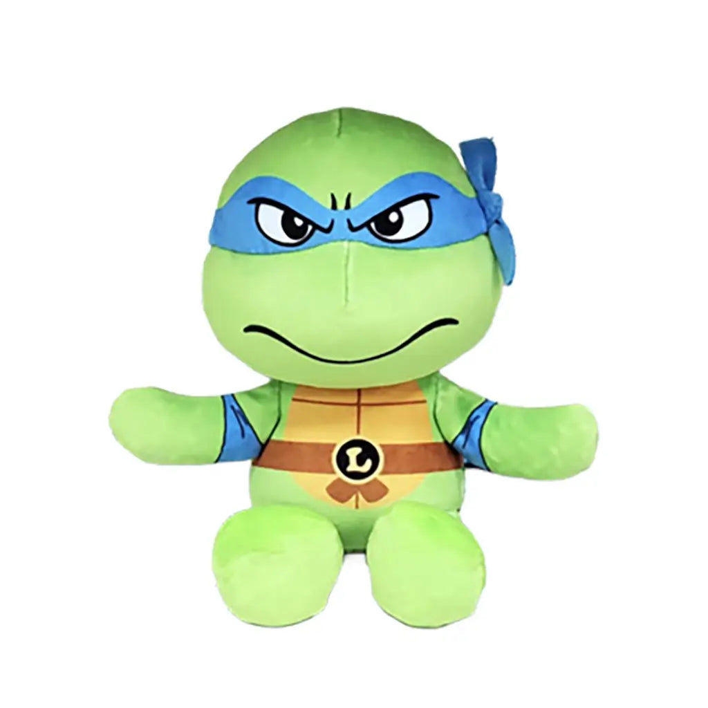 Leonardo TMNT plush toy in bright green soft fabric, with a blue eye mask, tan shell chest, brown belt and L emblem, seated with open arms against a plain white background.