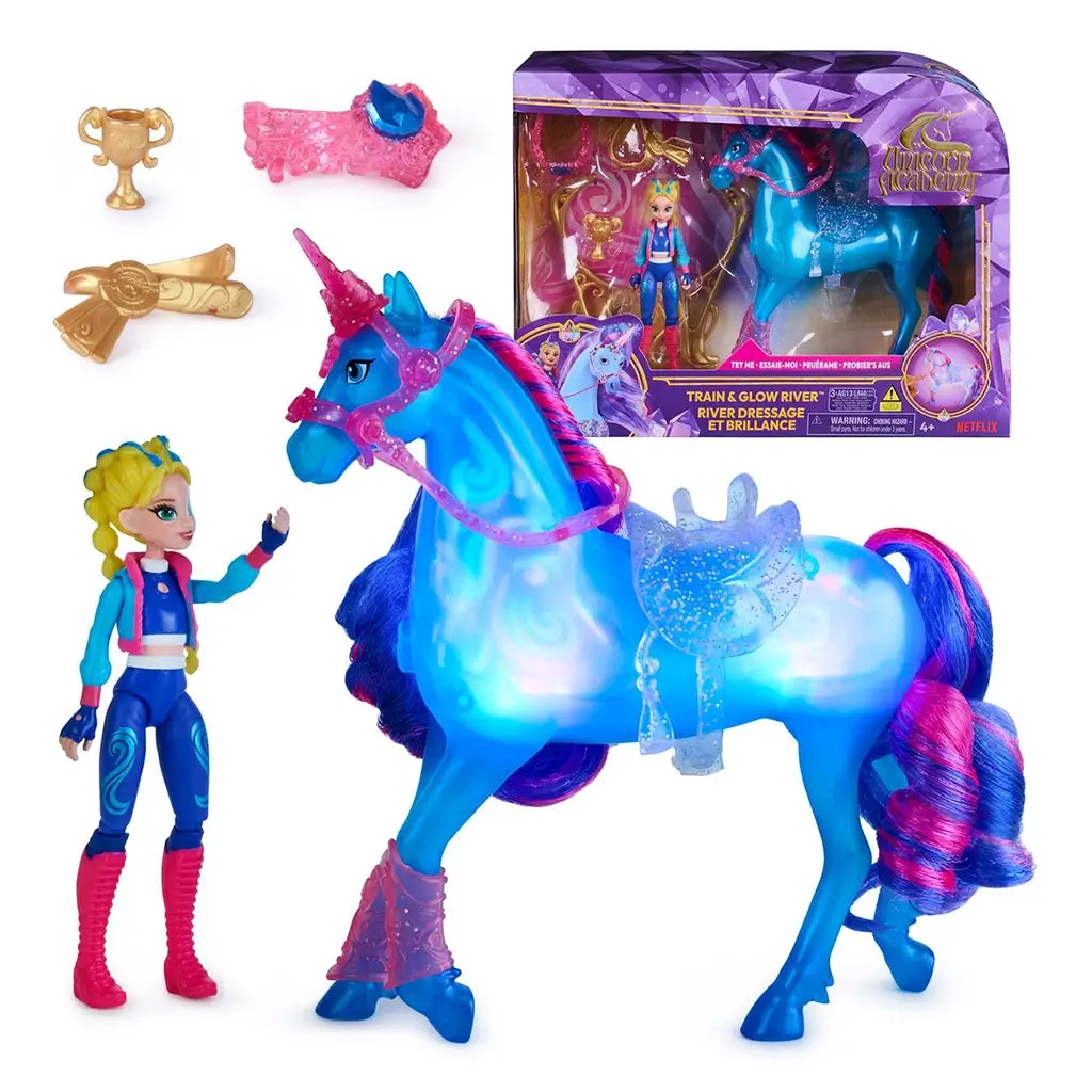 Unicorn Academy River Train and Glow playset packaging showing unicorn and rider through clear window, purple geometric graphics, gold accents, and Netflix series branding on fantasy-themed box.
