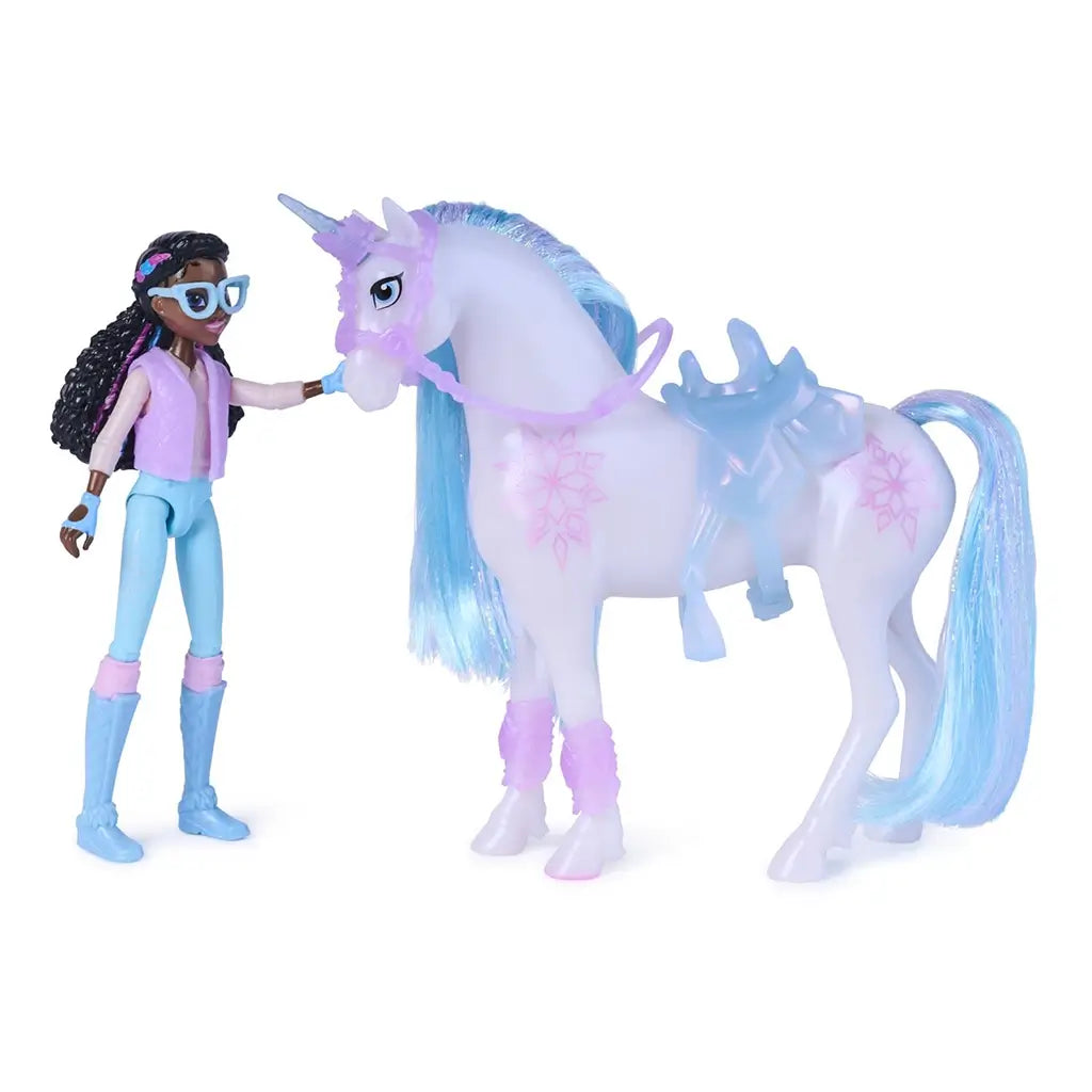 Unicorn Academy side view of Layla doll and Glacier unicorn toy, showing pastel plastic textures, molded saddle, flowing blue mane, and character interaction designed for pretend play and collectible display.