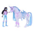 Unicorn Academy side view of Layla doll and Glacier unicorn toy, showing pastel plastic textures, molded saddle, flowing blue mane, and character interaction designed for pretend play and collectible display.