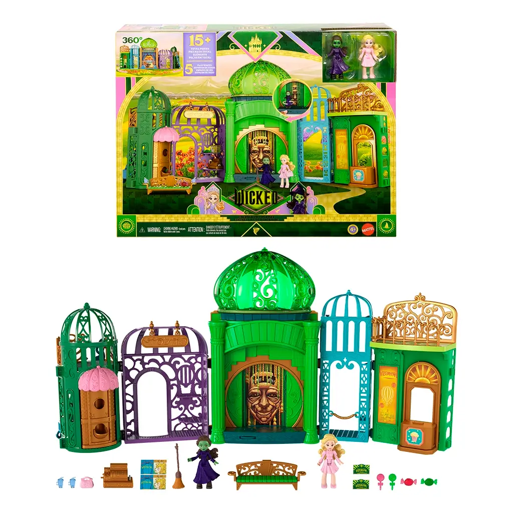 Wicked Emerald City small doll playset retail packaging featuring illustrated city backdrop, modular buildings, included Glinda and Elphaba dolls, accessories count, and Universal Pictures Wicked branding on the box front.