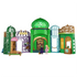 Wicked Emerald City playset featuring green and gold molded plastic buildings with ornate arches, domed rooftops, and fantasy city details, inspired by Universal Pictures Wicked and designed for small doll storytelling play.