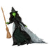 Wicked Elphaba Thropp fashion doll shown in deep black and emerald green colors, featuring textured fabric coat, layered skirt, pointed witch hat, and broom, posed dynamically to highlight articulation, dramatic cape flow, and iconic Wicked character design.