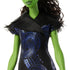 Wicked Elphaba doll close-up showing green skin, textured black fabric dress with blue metallic swirl patterns, fitted bodice and fringed collar, highlighting detailed costume design on a white studio backdrop.