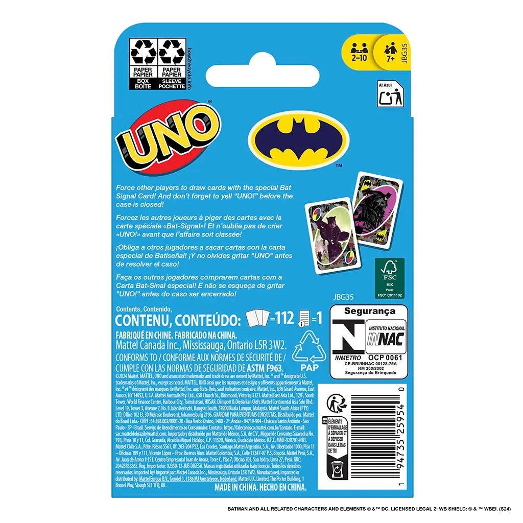 Back of Batman UNO card game packaging in bright blue with Batman logo, card previews, safety labels, and multilingual game instructions printed in white and black.