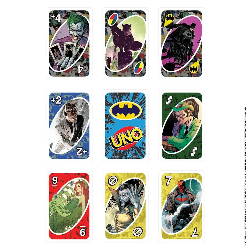 Batman UNO card set laid out showing Joker, Catwoman, Batman, Riddler, Poison Ivy, Two-Face, and game logo designs on bold red, green, yellow, and blue backgrounds.