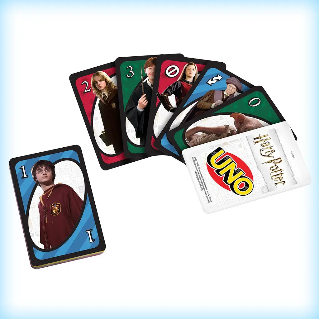 Spread of Harry Potter UNO cards featuring Hermione, Ron, Harry, Ginny, Professor Quirrell, and Dobby, with a deck of cards stacked nearby.