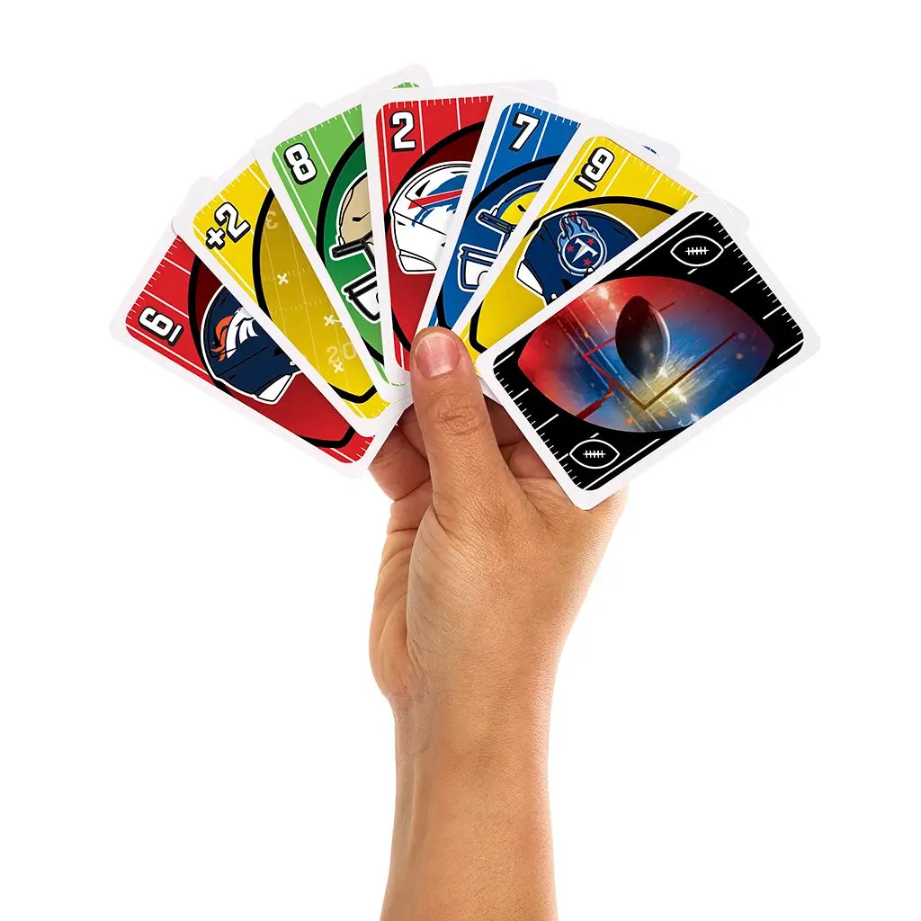 NFL UNO card game hand of colorful cards featuring team helmets, bold numbers, and football-themed designs held against a plain background for a sports-themed family activity.