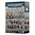 Warhammer 40,000 Adepta Sororitas Combat Patrol box shows gray and black matte cardboard packaging, rectangular in form, presenting Citadel miniatures for tabletop wargaming, arranged on rocky ground within a gothic city ruin battlefield.