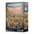 Warhammer 40,000 Combat Patrol Imperial Fists miniature box featuring 21 yellow-armored Space Marines posed for battle across ruined terrain under a fiery sky.