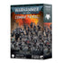 Warhammer 40,000 Combat Patrol Raven Guard miniature box with 17 dark-armored warriors and a dreadnought mech advancing across war-torn ruins under an orange sky.