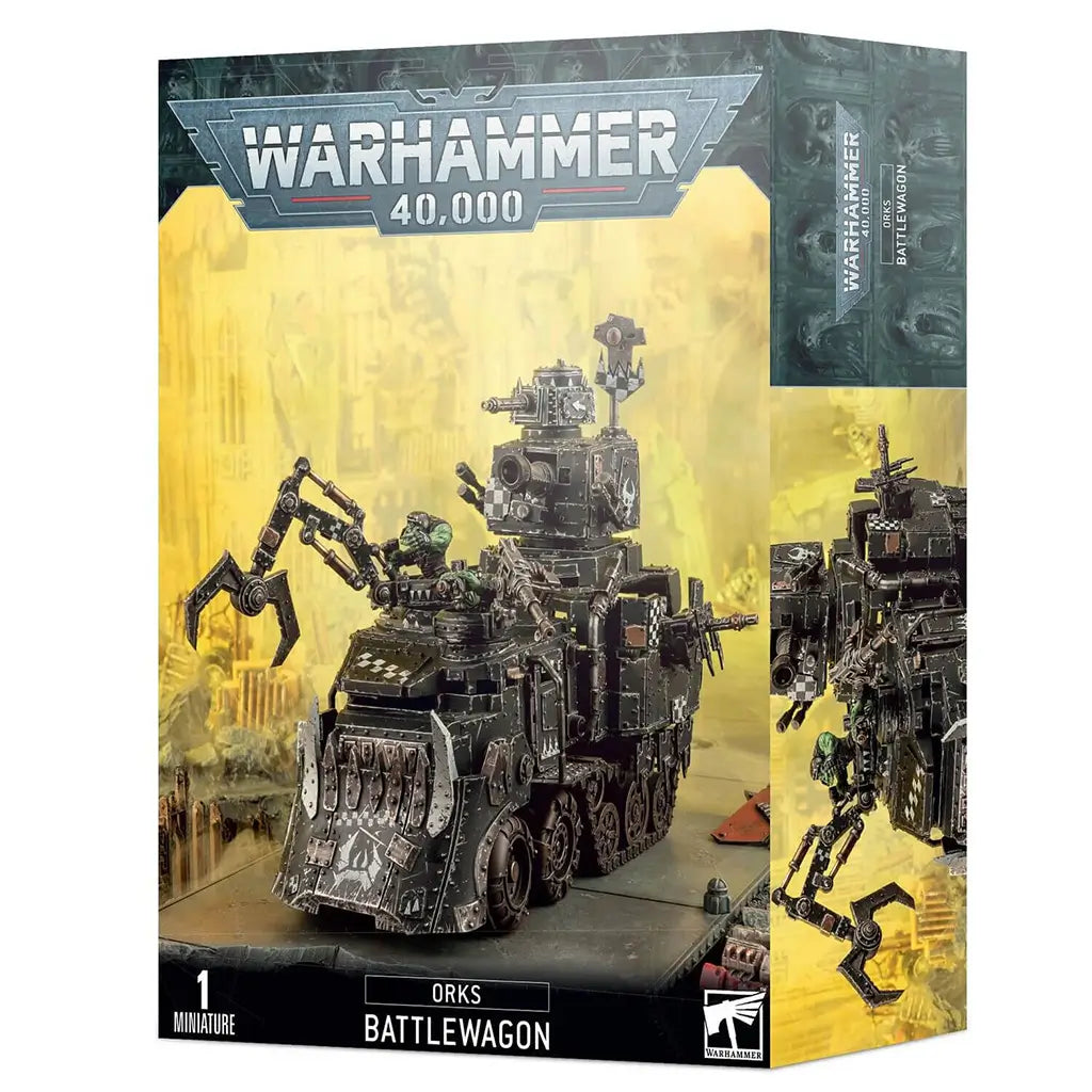Warhammer 40,000 Ork Battlewagon miniature with dark green armored metal panels, boxy tracked vehicle form, spiked front ram, mounted guns, and crane arm, used as Orks heavy transport in battle.