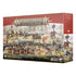 Warhammer Age of Sigmar Cities of Sigmar Founding Foray Battleforce box shows red and tan textured cardboard packaging, rectangular in form, featuring Citadel miniatures for tabletop wargaming, depicting armored soldiers and heroes advancing across a fortified city landscape.