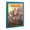Warhammer The Old World Arcane Journal book with teal hardcover and ornate gold border, tall rectangular format, depicting skeletal warriors and undead cavalry advancing across a desert battlefield.