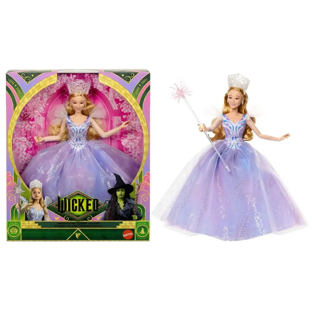 Wicked Glinda deluxe fashion doll packaging displays bright pink and green cardboard with glossy finish, arched window shape, and branded Wicked graphics, presenting the Mattel Glinda doll clearly for retail shelf display.