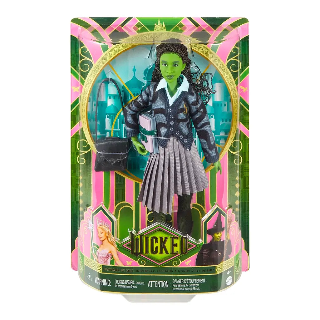 Retail package of Wicked Elphaba doll with accessories displayed in green and pink box, featuring images from the Wicked musical.