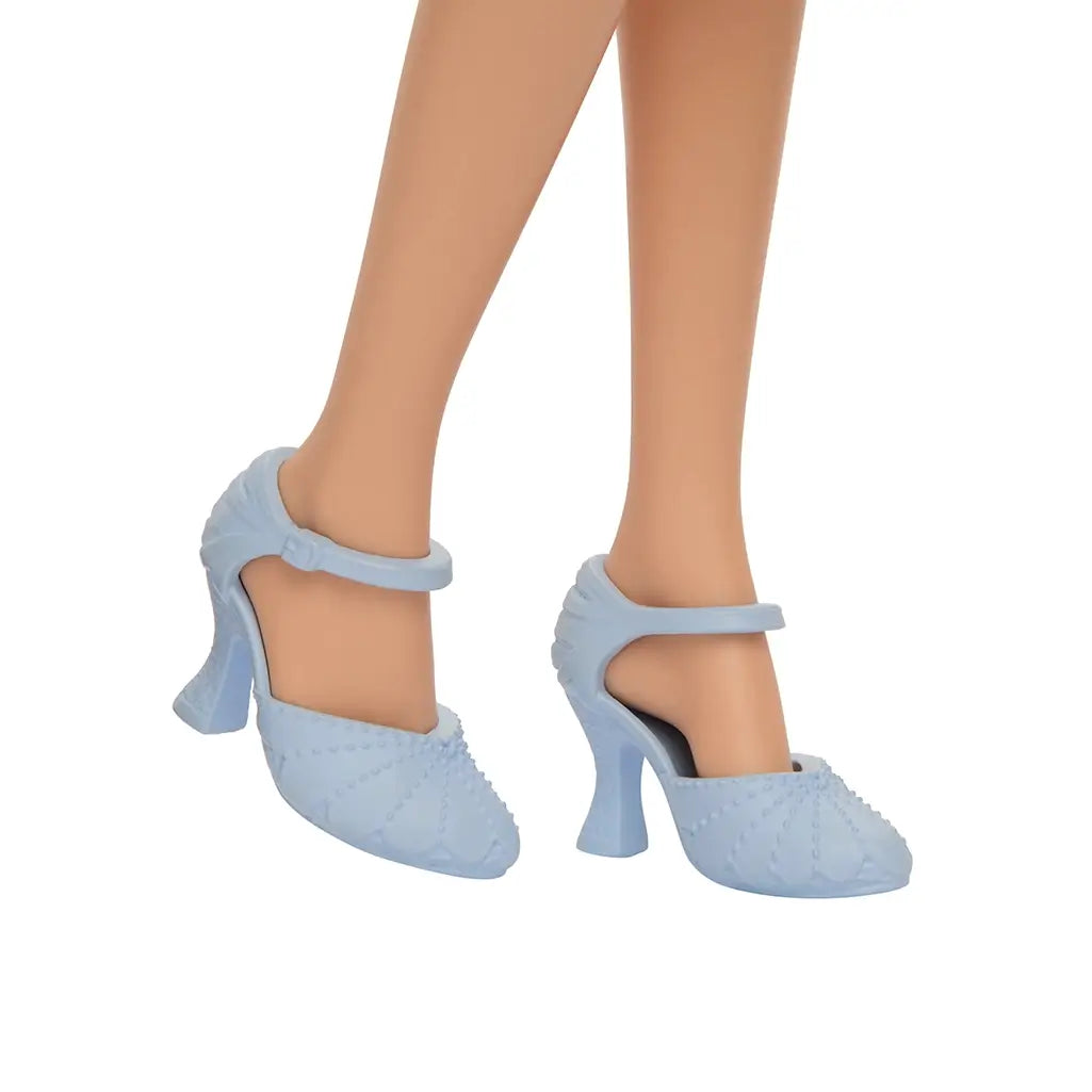 Close-up of Wicked Glinda doll’s light blue high-heeled shoes with quilted texture and ankle strap design.