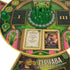 Close-up view of the Wicked board showing open storybook-style chapter cards and the Elphaba player mat, revealing intricate design and narrative elements.