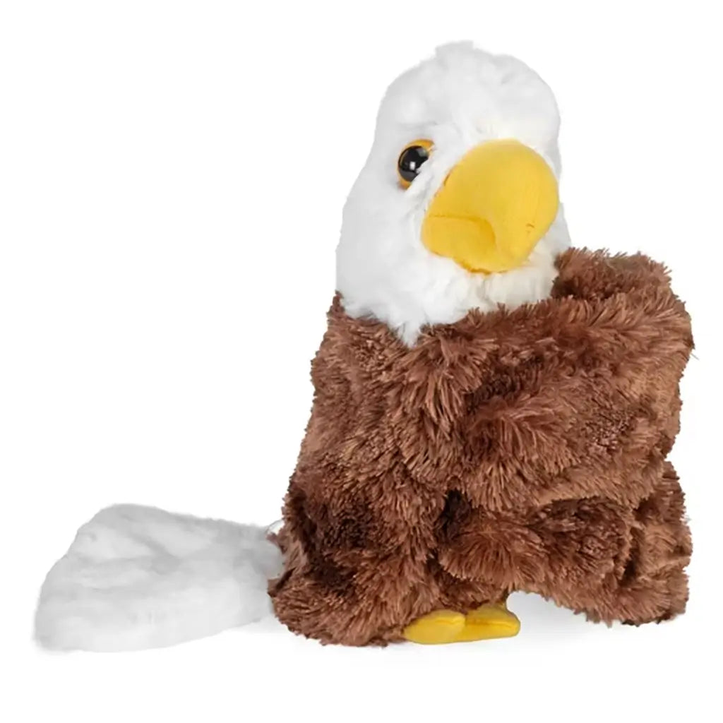 Wild Republic bald eagle plush toy in brown and white soft fabric with fuzzy texture, side profile highlighting curved yellow beak and folded wings, lifelike bird form designed as a huggable stuffed eagle.