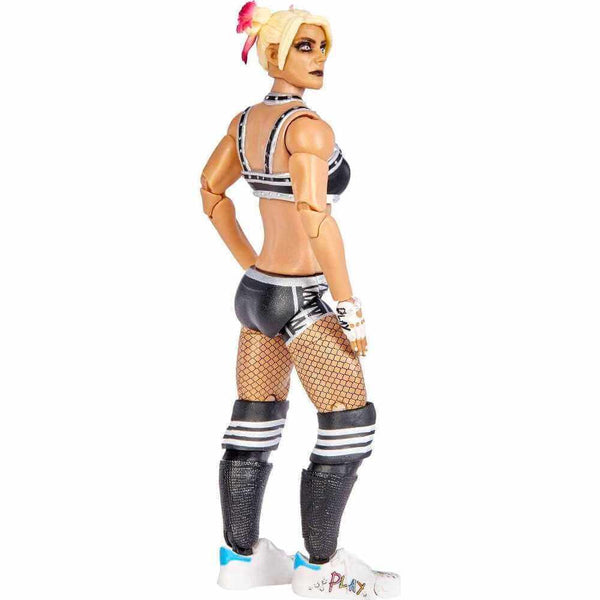 WWE Alexa Bliss Ultimate Edition figure shown from the back, blonde hair with pink highlights, detailed black and silver ring gear, articulated joints and boot details clearly visible against a white background.