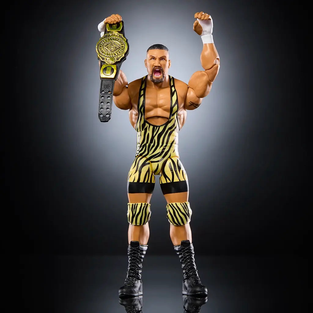 WWE Elite Bron Breakker Series 119 action figure holding gold championship belt overhead, dressed in tiger-striped yellow singlet, showing articulation and lifelike wrestling pose in dynamic stance.