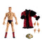 WWE Elite Collection Ilja Dragunov action figure shown with accessories including red and black boots, removable patterned robe, interchangeable hands, and NXT championship belt.