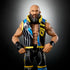 WWE Elite Tommaso Ciampa action figure with black and blue detailed entrance vest, muscular build, and lifelike beard sculpt displayed against a dark gradient background.