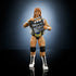 WWE Elite Collection Brian Pillman Series 116 figure posed holding a black movie clapperboard accessory, wearing black trunks, silver vest, championship belt, white boots, and black knee pads.