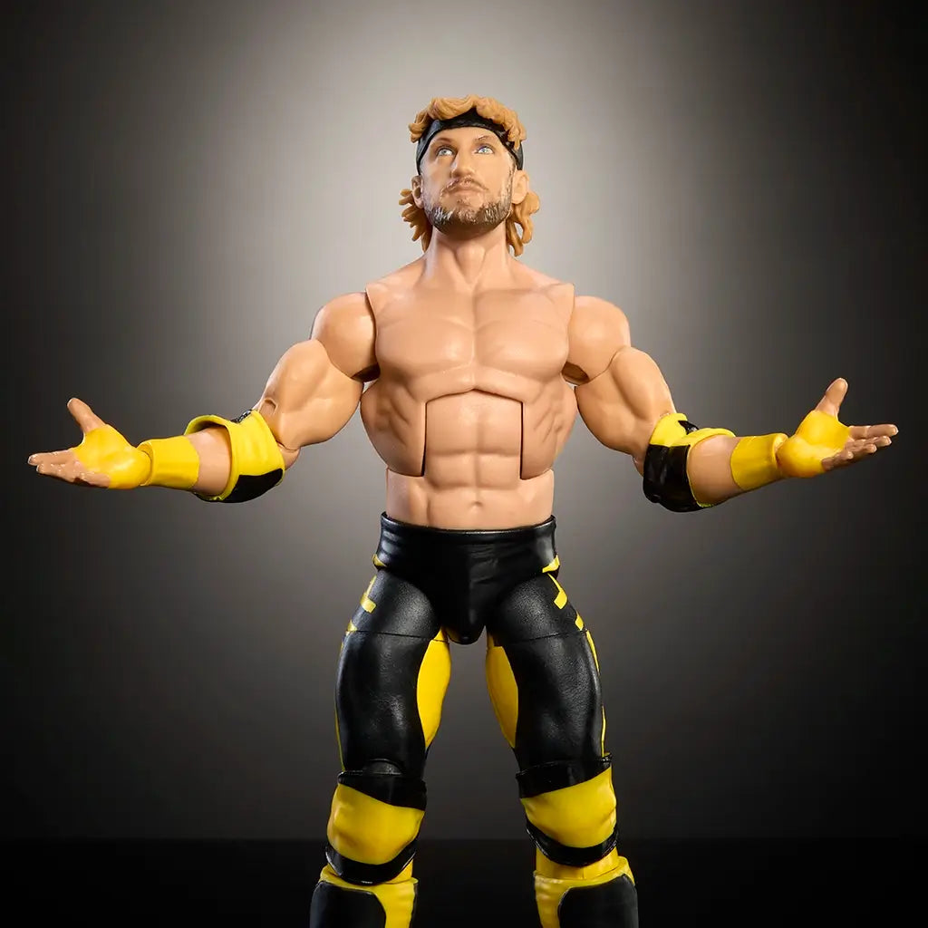 WWE Logan Paul action figure with muscular build, black and yellow wrestling gear, and raised arms posed under spotlight, showcasing detailed sculpting and articulation.