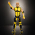 WWE Logan Paul collectible figure posed with raised fist, wearing detailed black and yellow vest, matching pants, and yellow wrist gear in studio lighting.