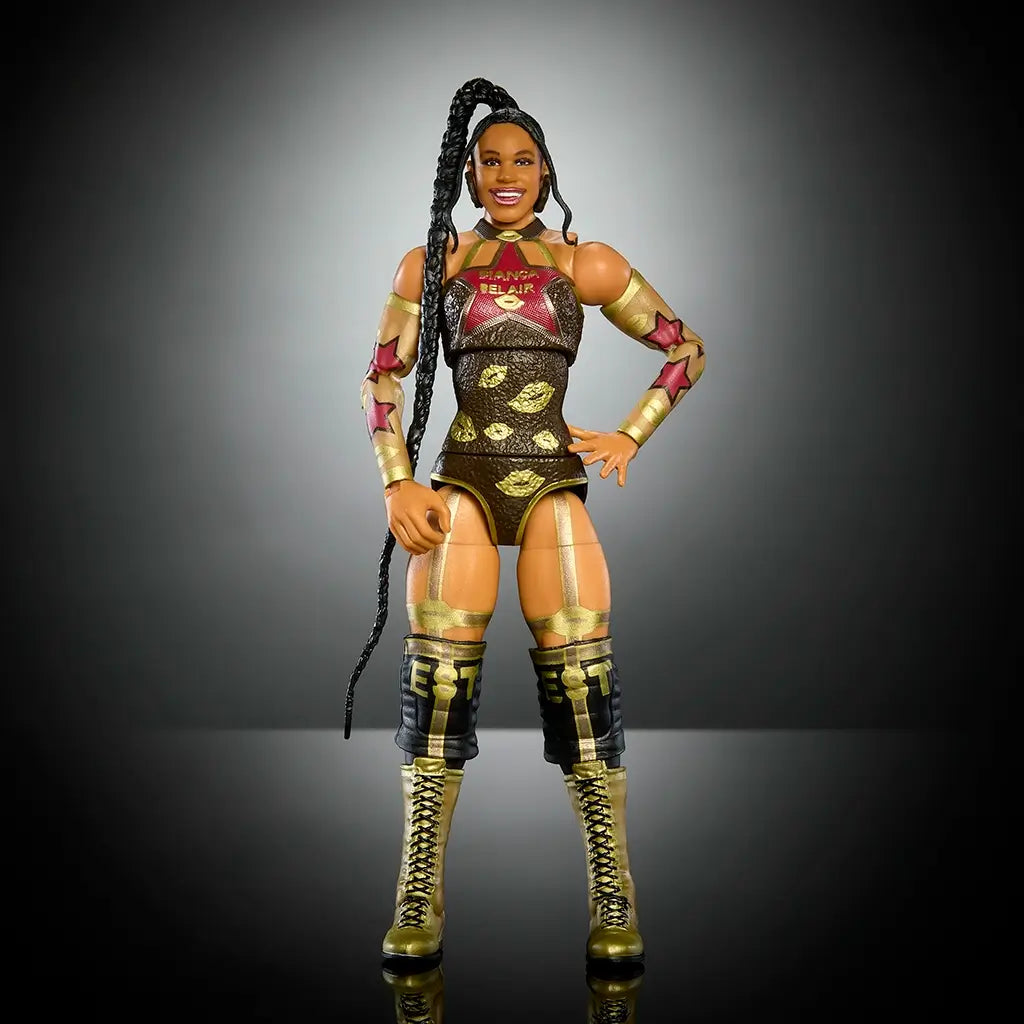 Front view of Bianca Belair Elite Collection WWE action figure wearing black and gold gear with EST knee pads, gold boots, and braided ponytail, smiling with confident stance.