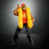 WWE Hulk Hogan wrestling figure posed with yellow feather boa, red Hulk’s Rules shirt, sunglasses, and black pants, hand-to-ear gesture iconic to his wrestling persona.