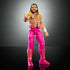 Full front view of WWE Elite Seth Rollins figure in pink wrestling gear, smiling face, chest tattoo, and open stance with hands extended on reflective black surface.