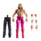 WWE Seth Rollins Elite action figure with accessories including interchangeable hands and Howard Finkel build-a-figure legs, posed in pink pants and red boots.
