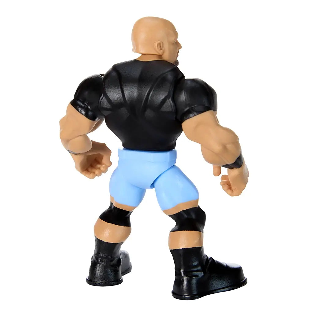 Rear angled view of WWE Knuckle Crunchers Stone Cold Steve Austin 3.5-inch figure showing sculpted muscular back, black short-sleeve shirt, blue trunks, knee pads, and tall wrestling boots.