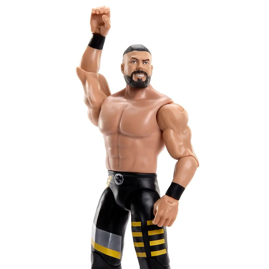 WWE Main Event Series Andrade wrestling figure close-up highlighting tan plastic skin tone, detailed facial sculpt with beard, defined chest and abs, black wristbands, and confident expression photographed against a clean white background.